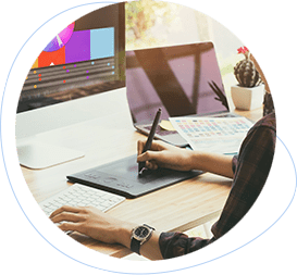 a person using a pen on a design tablet