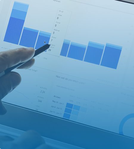 a person viewing a bar graph with PPC marketing data