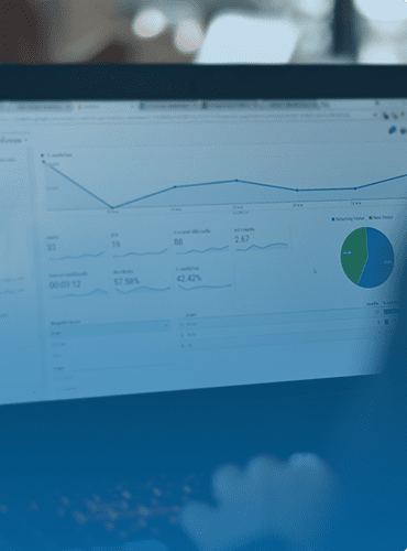 laptop with analytics charts