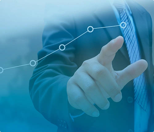 a woman with glasses doing a Google search on a laptop