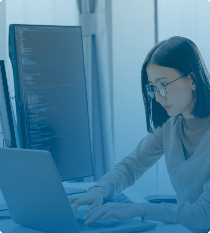woman in front of computer typing