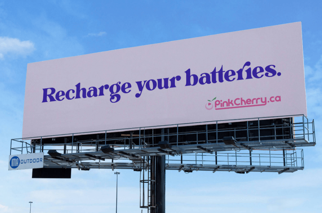 a billboard saying ‘Recharge your batteries’

