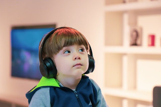 child with headphones