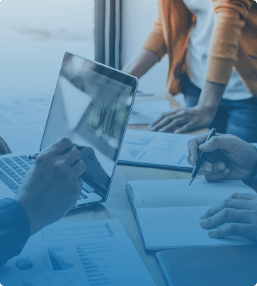 people meeting around laptop