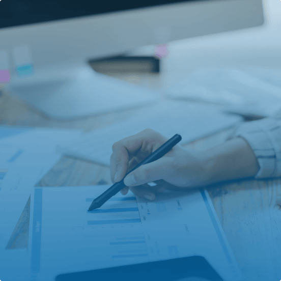 Data-Driven Klaviyo Insights – A close-up of a person analyzing performance metrics and graphs, representing the importance of data in refining Klaviyo email and SMS marketing strategies.