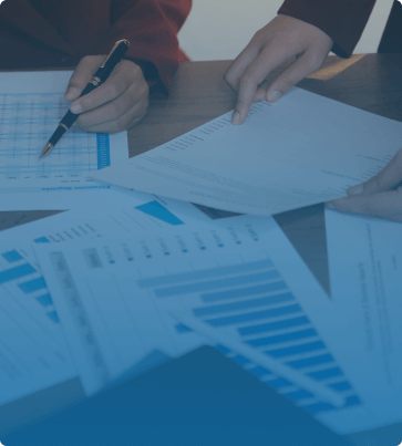 Strategic Email Marketing Planning with Klaviyo – Two professionals reviewing marketing performance reports and analytics, emphasizing how Klaviyo agencies optimize campaigns for maximum ROI.