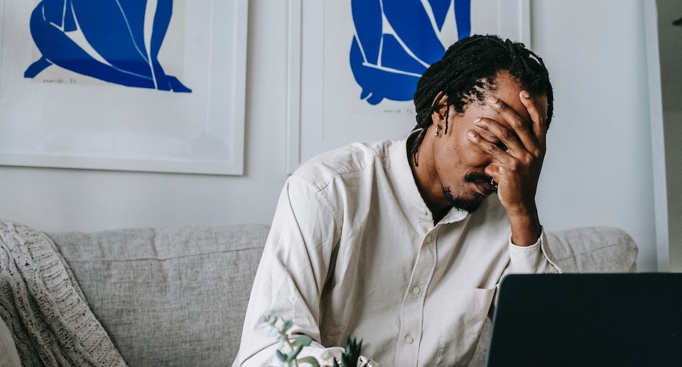 Man making a common email marketing mistake