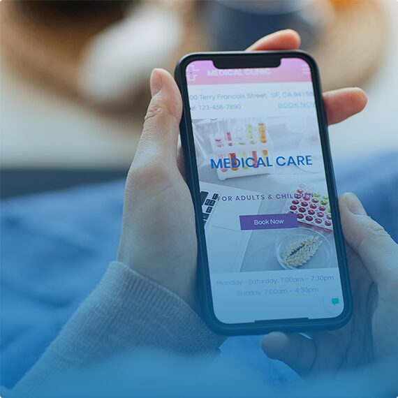 hands holding a mobile phone with a medical website