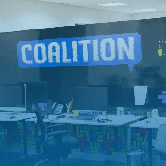 "Coalition" sign over a table