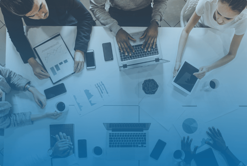 top view of people working on their gadgets